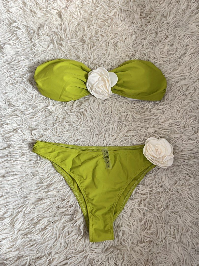 Two piece bikini swimwear (L-XL) (Category: Bikinis & Swimsuits) located in Bacolod City. Submitted by glamgeek.bcd (Listing ID 1458739833, Image 1). Description: - Cute lime green bikini set - Bandeau top with large white flower accent - High-waisted bottoms with smaller flower detail - Ideal for beach days and pool parties - Comfortable and stylish design.