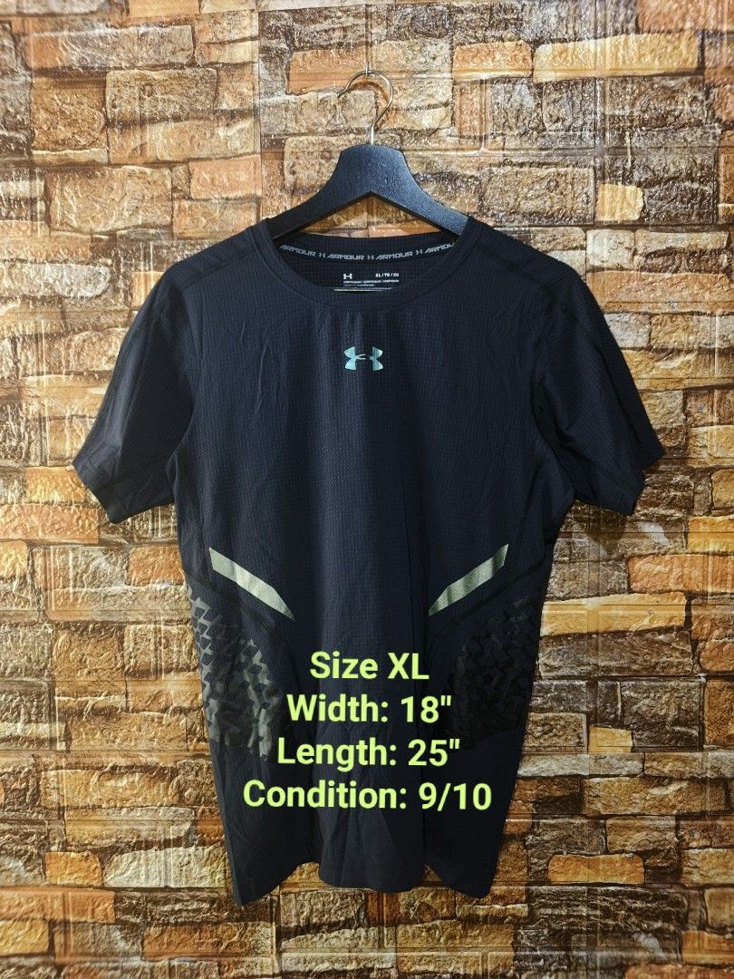 Under Armour Compression T-Shirt XL Black (Category: Activewear) located in Davao. Submitted by vndrgd (Listing ID 1458805021, Image 3). Description: - Under Armour Short Sleeve Compression T-Shirt - Color: Black with Green Logo - Size: XL - Ideal for Workouts or Layering - Measurements: 18" Wide, 25" Long - Condition: Good, worn only a few times.