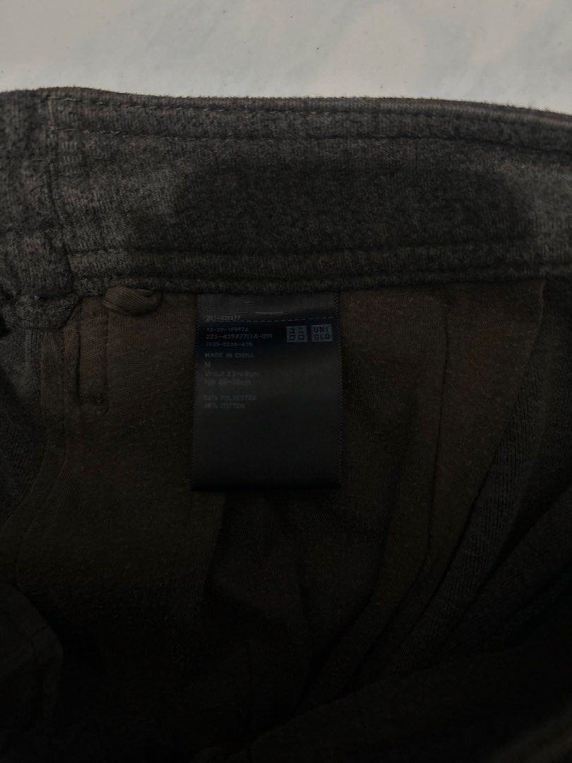 Uniqlo Dark Grey Cropped Pants Size M (Category: Other Bottoms) located in San Pedro. Submitted by annasant.s (Listing ID 1458744373, Image 2). Description: - Uniqlo Cropped Pants - Color: Dark Grey - Size: Medium (M) - Material: Comfortable fabric - Features: Elastic waistband, straight leg cut - Style: Casual, easy to pair with any top.