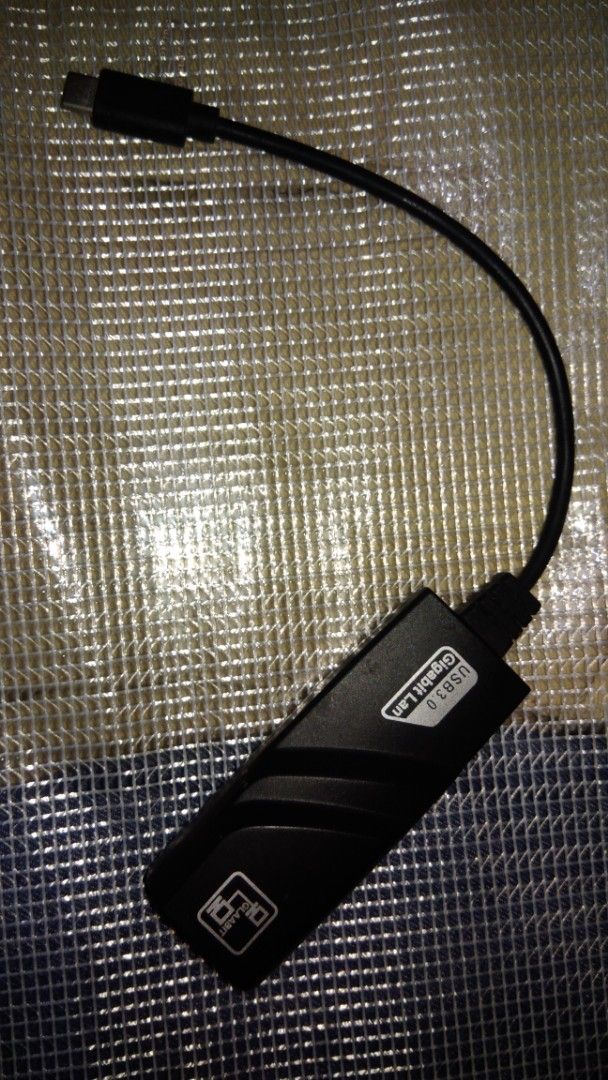 USB 3.0 Gigabit LAN Adapter with USB-C Connector (Category: Cables & Adaptors) located in Makati City. Submitted by julz2026 (Listing ID 1458698112, Image 2). Description: -Price is negotiable - Connect to wired internet via USB-C - Supports Gigabit LAN speeds for fast, stable connections - Ideal for laptops and tablets with USB-C ports - Plug and play setup, no drivers required for most systems.