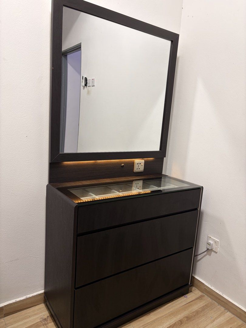 Vanity Table / Makeup table / Dressing table (Category: Tables & Sets) located in Shah Alam. Submitted by prelovedbylynnfau (Listing ID 1458790070, Image 1). Description: I’m letting go of my vanity table. Prefer self-pickup (nearby cyberjaya) or arrange your own lalamove/logistic with helper. Condition 7.5/10. Comes with a small chair, mirror, built-in lighting and socket, and partitions for organizing your items. Everything works well, except t