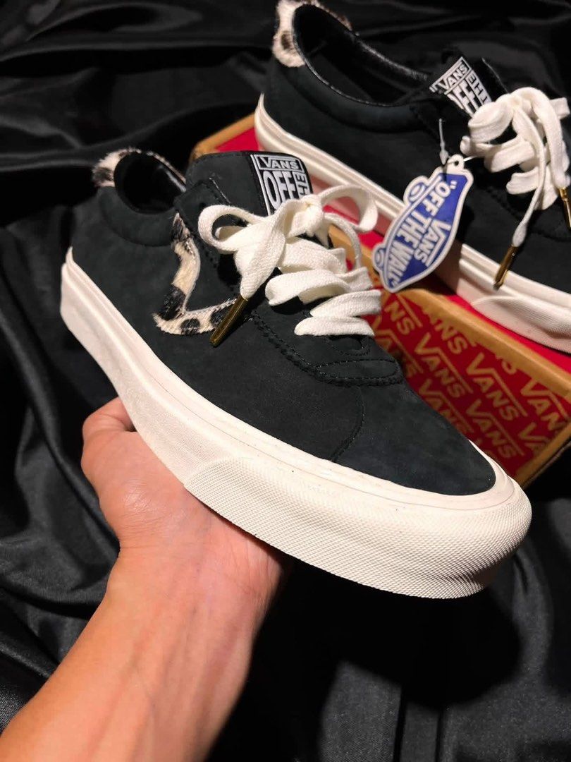 Vans Black Suede Leopard Fur Trim Sneakers (Category: Sneakers) located in Consolacion. Submitted by archerowar_20 (Listing ID 1458852160, Image 1). Description: -Usmen 9 - Black Vans sneakers - Suede material - Leopard print fur trim on heel and side stripe - White laces with gold tips - Includes original box and tags - Unique design.