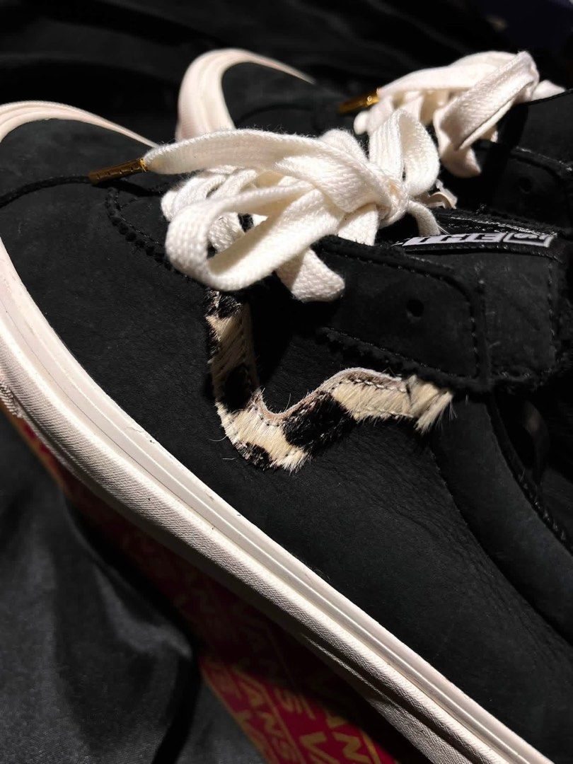 Vans Black Suede Leopard Fur Trim Sneakers (Category: Sneakers) located in Consolacion. Submitted by archerowar_20 (Listing ID 1458852160, Image 3). Description: -Usmen 9 - Black Vans sneakers - Suede material - Leopard print fur trim on heel and side stripe - White laces with gold tips - Includes original box and tags - Unique design.