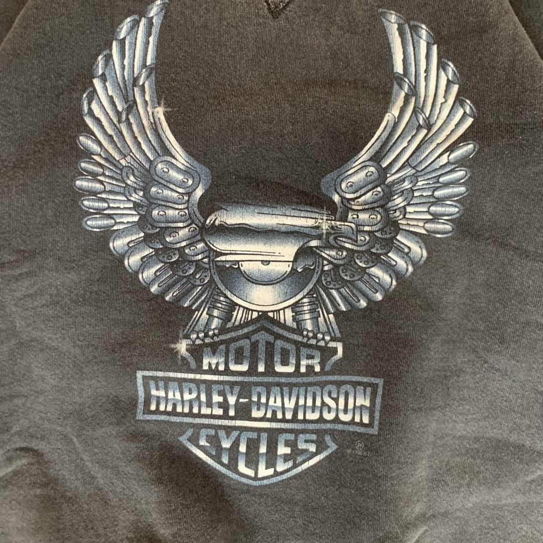 Vintage 1996 Harley-Davidson Eagle Graphic Sweatshirt (Category: Coats, Jackets and Outerwear) located in Cebu City. Submitted by zen.lasonking (Listing ID 1458837107, Image 3). Description: Classic Harley-Davidson sweatshirt. Features the iconic eagle graphic on the front. Copyright 1996. Great for any fan. Has a small Harley logo on the sleeve too. Crewneck style..