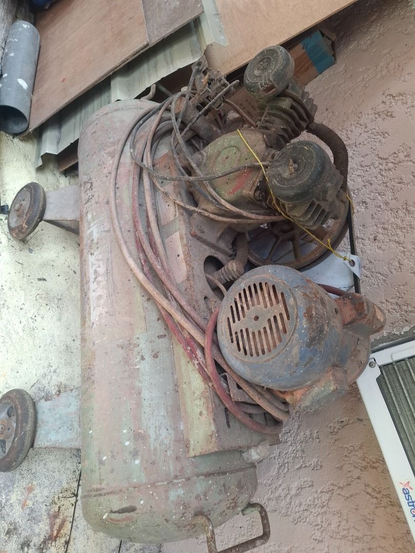 Vintage Air Compressor with Motor (Category: Construction Tools & Equipment) located in Caloocan City. Submitted by nathan_velasco (Listing ID 1458703400, Image 2). Description: - Old school air compressor - Motor still attached - Equipped with wheels for portability - Ideal for DIY projects or spare parts - Sold as is.