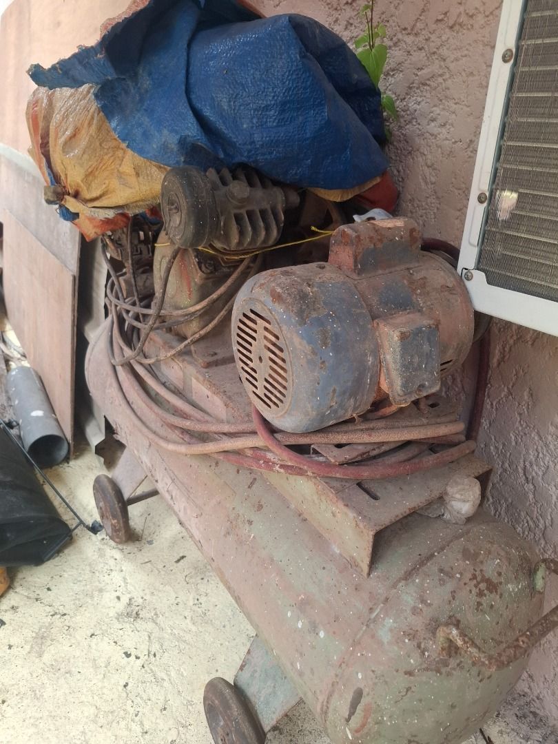 Vintage Air Compressor with Motor (Category: Construction Tools & Equipment) located in Caloocan City. Submitted by nathan_velasco (Listing ID 1458703400, Image 3). Description: - Old school air compressor - Motor still attached - Equipped with wheels for portability - Ideal for DIY projects or spare parts - Sold as is.