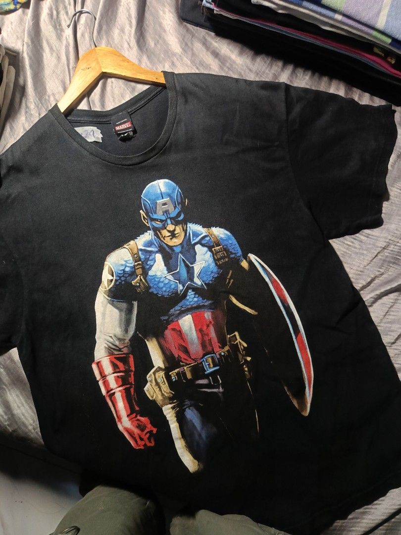 Vintage MarvelMad engine Ultimate captain America (Category: Tshirts & Polo Shirts ) located in Binangonan. Submitted by uhwhynot (Listing ID 1458738213, Image 1). Description: has pin holea on hem.