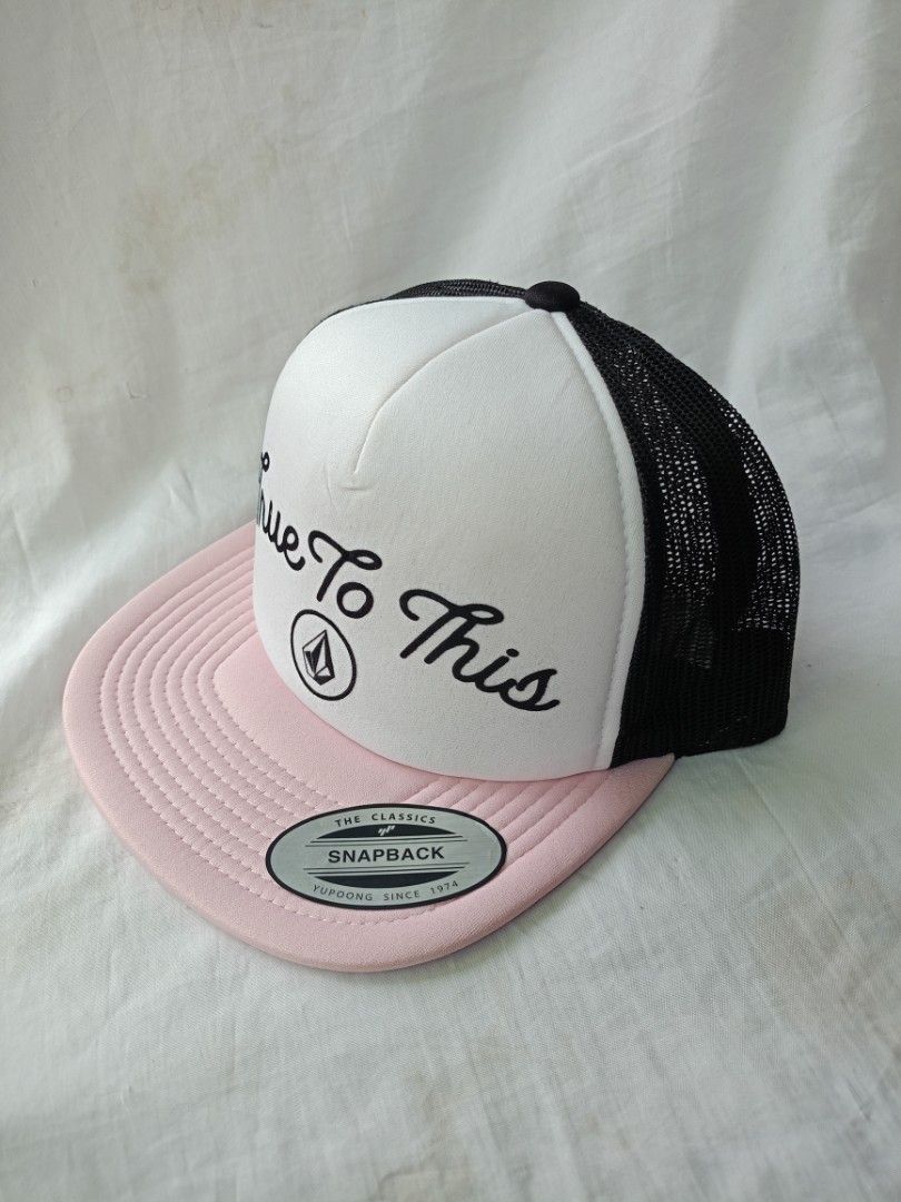 Volcom "True To This" Snapback Trucker Cap Pink White Black (Category: Caps & Hats) located in Santiago. Submitted by street.hustlin (Listing ID 1458710176, Image 2). Description: - Volcom snapback trucker cap - White front panel with "True To This" embroidery and Volcom logo - Black mesh back for breathability - Pink brim for a pop of color - Adjustable snap closure for a custom fit - Features Yupoong Classics tag - Ideal for everyday casual wea