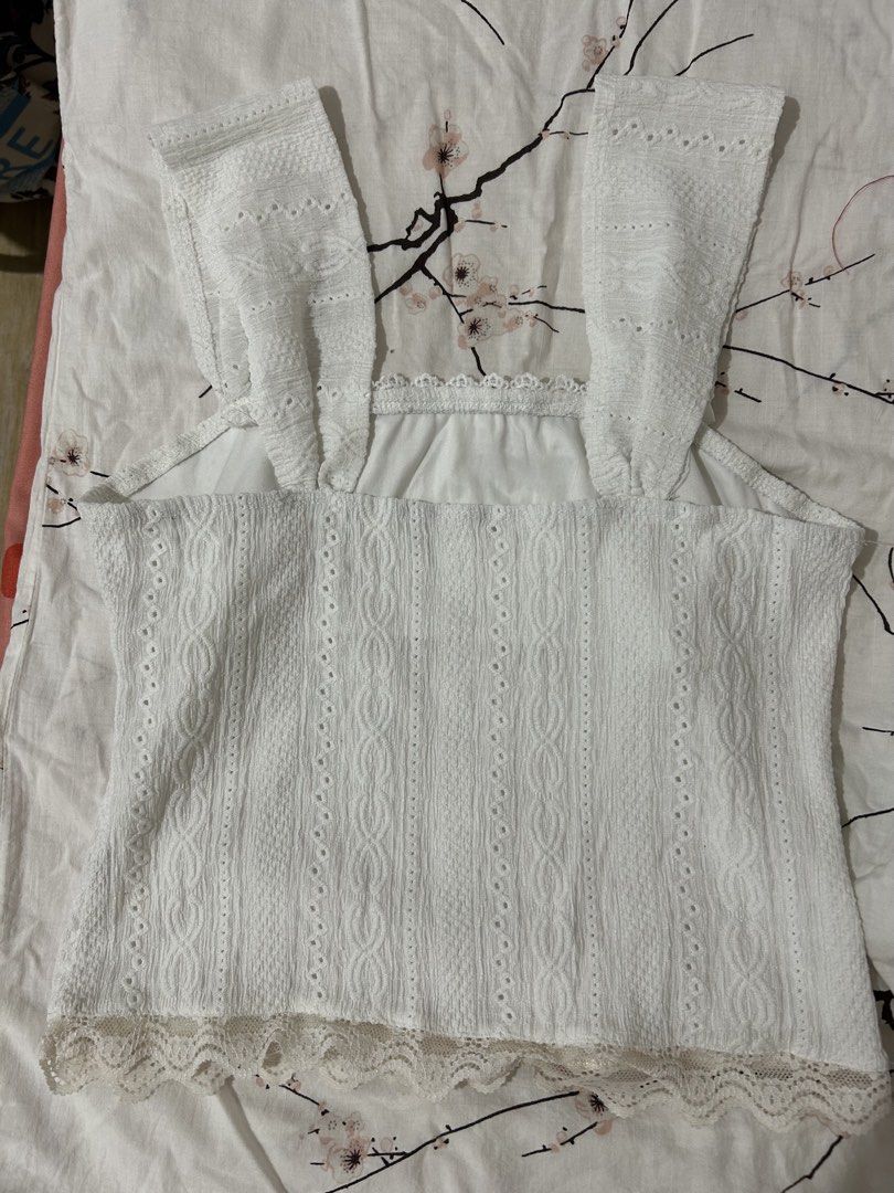 White eyelet, ribbon, lacy, beach top (Category: Blouses) located in San Fernando. Submitted by handmelovez (Listing ID 1458827058, Image 2). Description: S-m size Fairly stretchy.