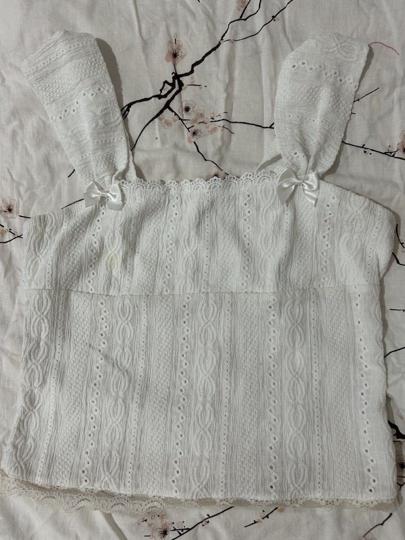 White eyelet, ribbon, lacy, beach top (Category: Blouses) located in San Fernando. Submitted by handmelovez (Listing ID 1458827058, Image 1). Description: S-m size Fairly stretchy.