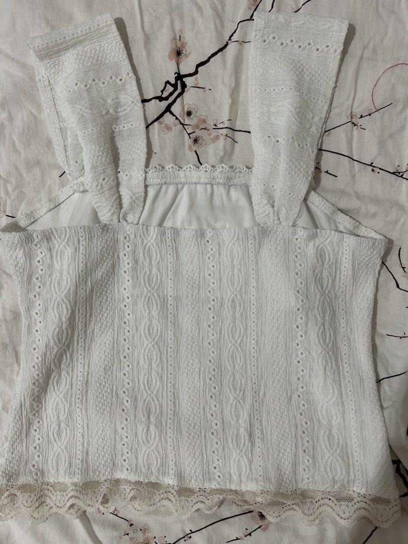 White eyelet, ribbon, lacy, beach top (Category: Blouses) located in San Fernando. Submitted by handmelovez (Listing ID 1458827058, Image 3). Description: S-m size Fairly stretchy.