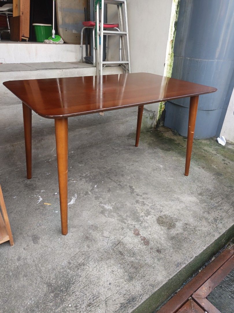 Dinning table japan surpluz (Category: Tables & Sets) located in Valenzuela. Submitted by kendra071914 (Listing ID 1458715045, Image 3). Description: - Rectangular wooden dining table - Warm brown wood finish - Mid-century modern style with tapered legs - Seats 4-6 people - Perfect for small apartments or dining nooks - Dimensions: Height 70cm, Length 120cm, Width 75cm - Pick up only.