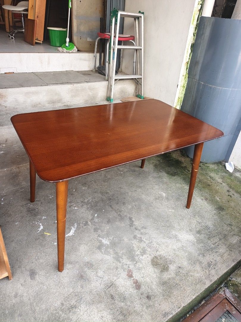 Dinning table japan surpluz (Category: Tables & Sets) located in Valenzuela. Submitted by kendra071914 (Listing ID 1458715045, Image 2). Description: - Rectangular wooden dining table - Warm brown wood finish - Mid-century modern style with tapered legs - Seats 4-6 people - Perfect for small apartments or dining nooks - Dimensions: Height 70cm, Length 120cm, Width 75cm - Pick up only.