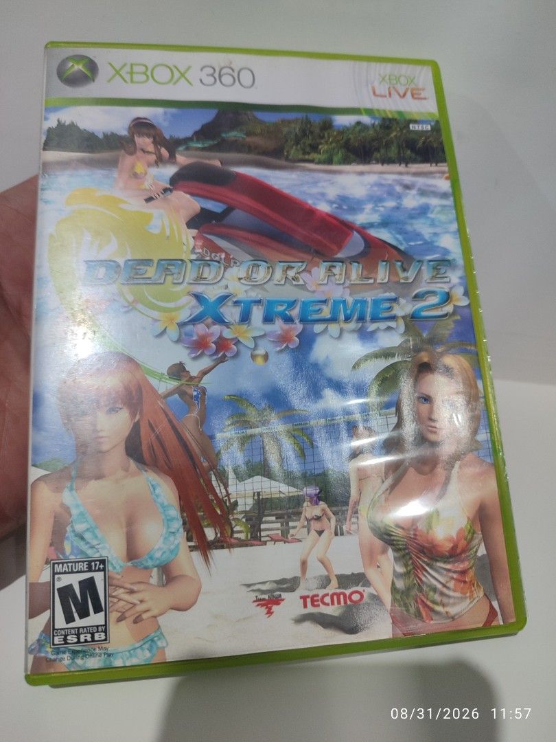 XBOX 360 - Dead or Alive Xtreme 2 (PRE-OWNED) "NTSC" (Category: Xbox) located in Mendez-Nunez. Submitted by sf2_gameshop (Listing ID 1458718323, Image 2). Description: PLEASE READ Plays on an NTSC XBOX 360 unit. NTSC/J - X (NO) NTSC - √ (YES) PAL - X (NO) CONDITION: A pre-owned item. Tested working. The game manual has rusty staples. Please refer to the posted photos for the item condition. GENRE: Sports, Casino MODE: Single-player, multiplayer R