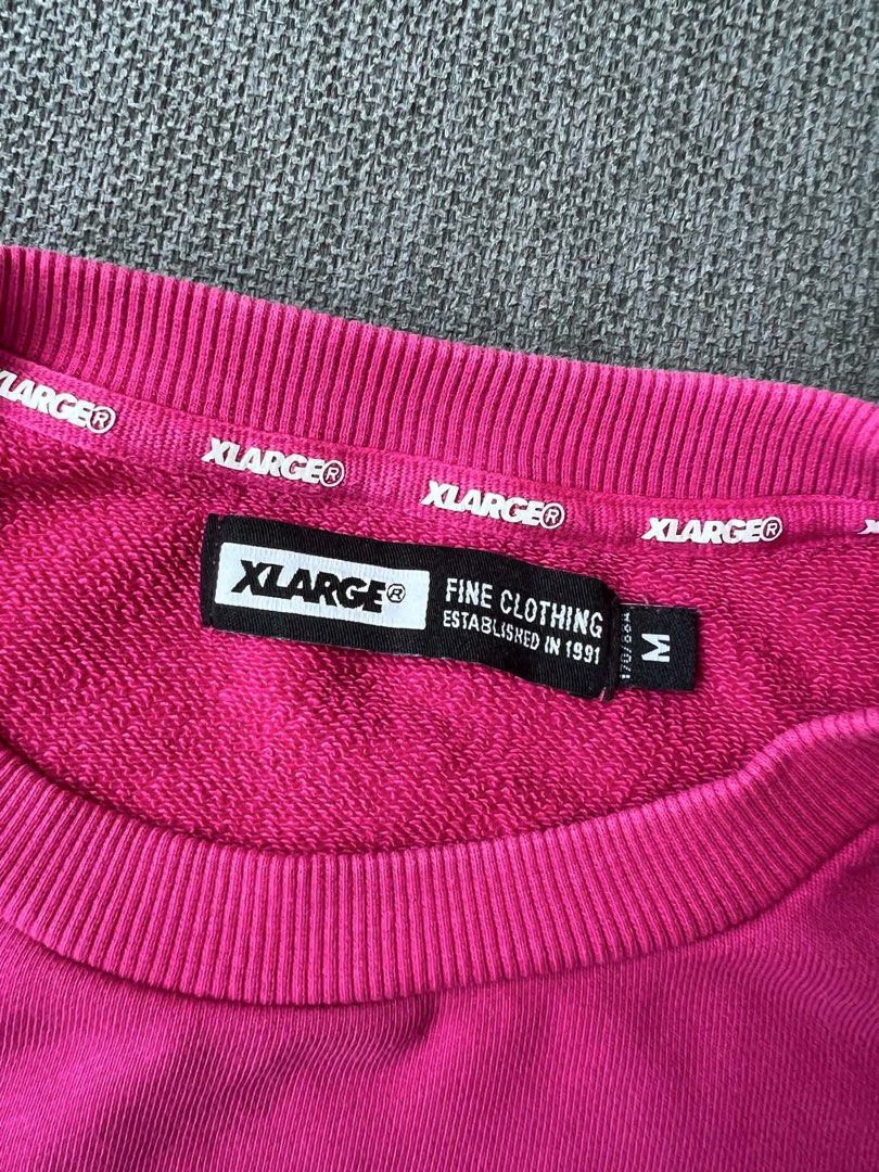 XLARGE® Pink Crewneck Sweatshirt Size M (Category: Coats, Jackets and Outerwear) located in Caloocan City. Submitted by junipercottageph (Listing ID 1458724416, Image 3). Description: - Brand: XLARGE® - Color: Pink - Size: M - Style: Crewneck sweatshirt with long sleeves - Features: Small embroidered logo on chest - Material: Cotton blend - Ideal for: Casual wear.