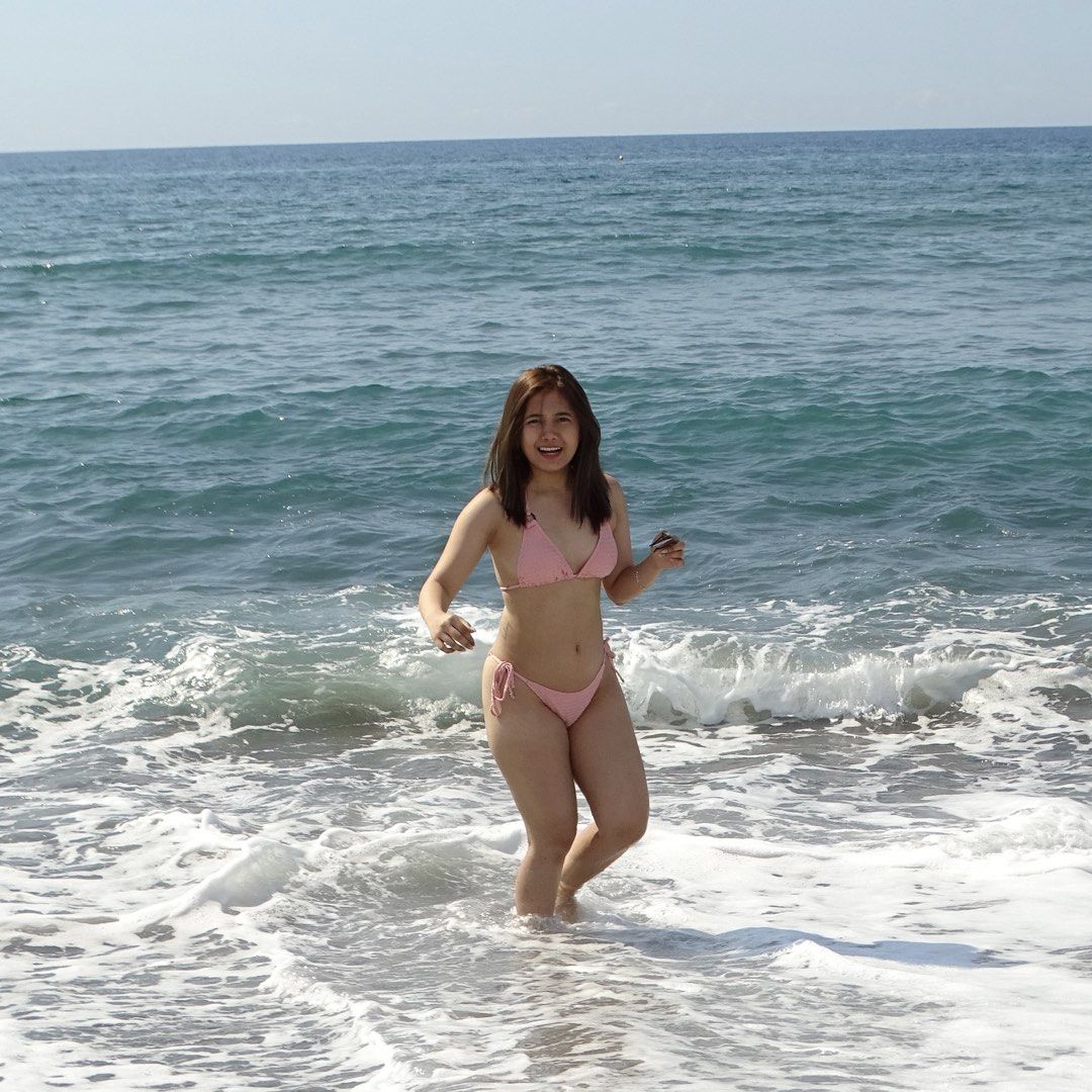 XS Pink Textured Triangle Bikini Set (Category: Bikinis & Swimsuits) located in Muntinlupa City. Submitted by jc444_ (Listing ID 1458677480, Image 3). Description: - Adorable pink bikini set - Textured fabric all over - Adjustable ties at neck and sides for a perfect fit - Chic ring details on bikini top straps - Tie-side bottoms for customizable comfort - Ideal for your next beach or pool day.