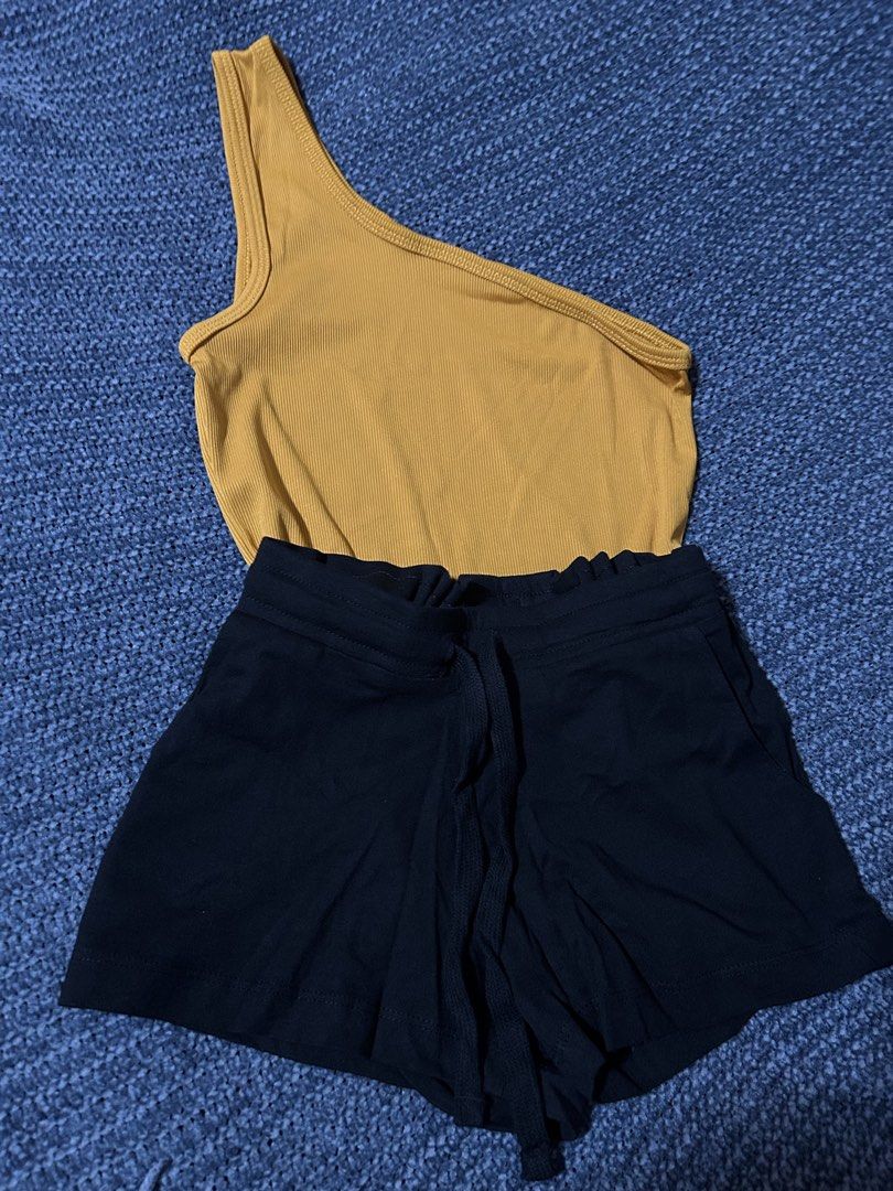 Yellow One-Shoulder Top & Black Shorts Set (Category: Babies & Kids Fashion) located in Pasig City. Submitted by mixpicks (Listing ID 1458817366, Image 1). Description: - Cute yellow one-shoulder ribbed top - Comfy black shorts with drawstring waist and pockets - Ideal for casual wear or lounging - Easy to mix and match - Imported branded short ( tag removed) - Yellow top is actually for free .