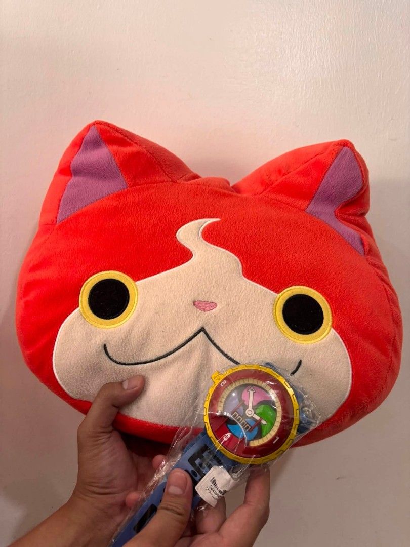 Yo-kai Watch Toy & Jibanyan Plush Set (Category: Plushies & Soft Toys) located in Cavite. Submitted by l1ttlelulu (Listing ID 1458779847, Image 1). Description: - Yo-kai Watch toy in original packaging - Features a blue strap and colorful watch face - Includes a bright red Jibanyan plush with signature markings - Ideal for any Yo-kai Watch enthusiast - Bundle includes both the watch and the plush.