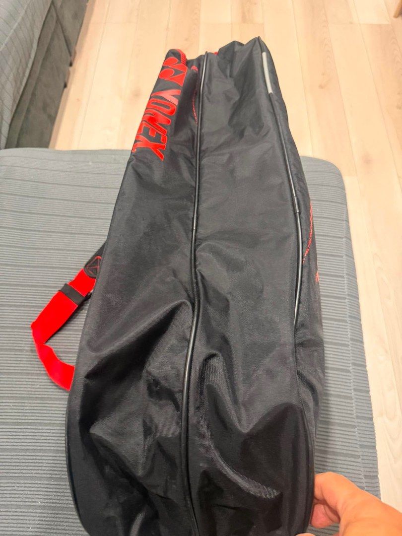 Yonex Tennis/Badminton Bag (Category: Racket and Ball Sports) located in Cavite. Submitted by grecegalang (Listing ID 1458846352, Image 2). Description: - Black and red Yonex bag - Includes shoulder strap - Ideal for badminton rackets and gear - Plenty of interior space - Secure zip closure - Ready for your next game.