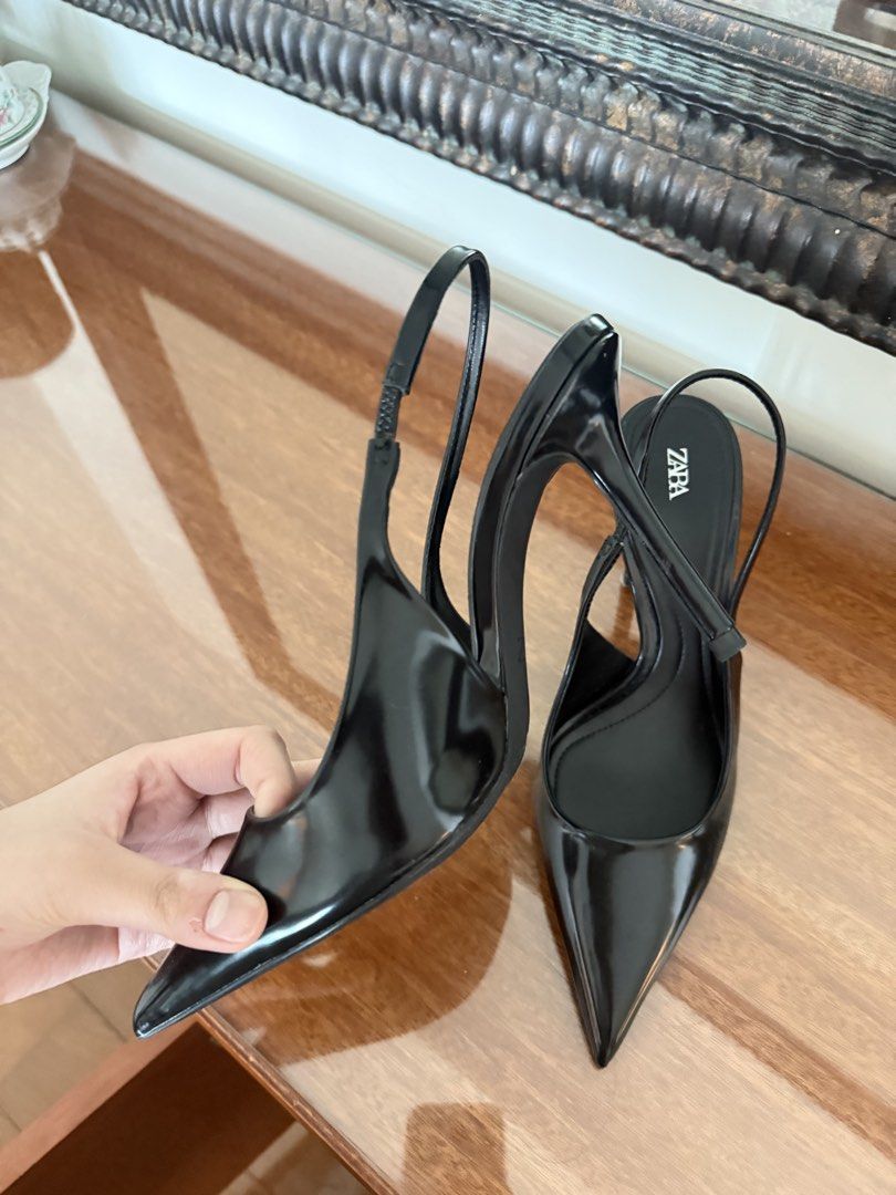 ZARA Black Slingback Pointed Toe Heels (Category: Heels) located in Makati City. Submitted by thriftytim (Listing ID 1458771672, Image 2). Description: - Classic black slingback heels from ZARA - Elegant pointed toe design - Secure and comfortable elasticated slingback strap - Versatile for both work and evening wear.