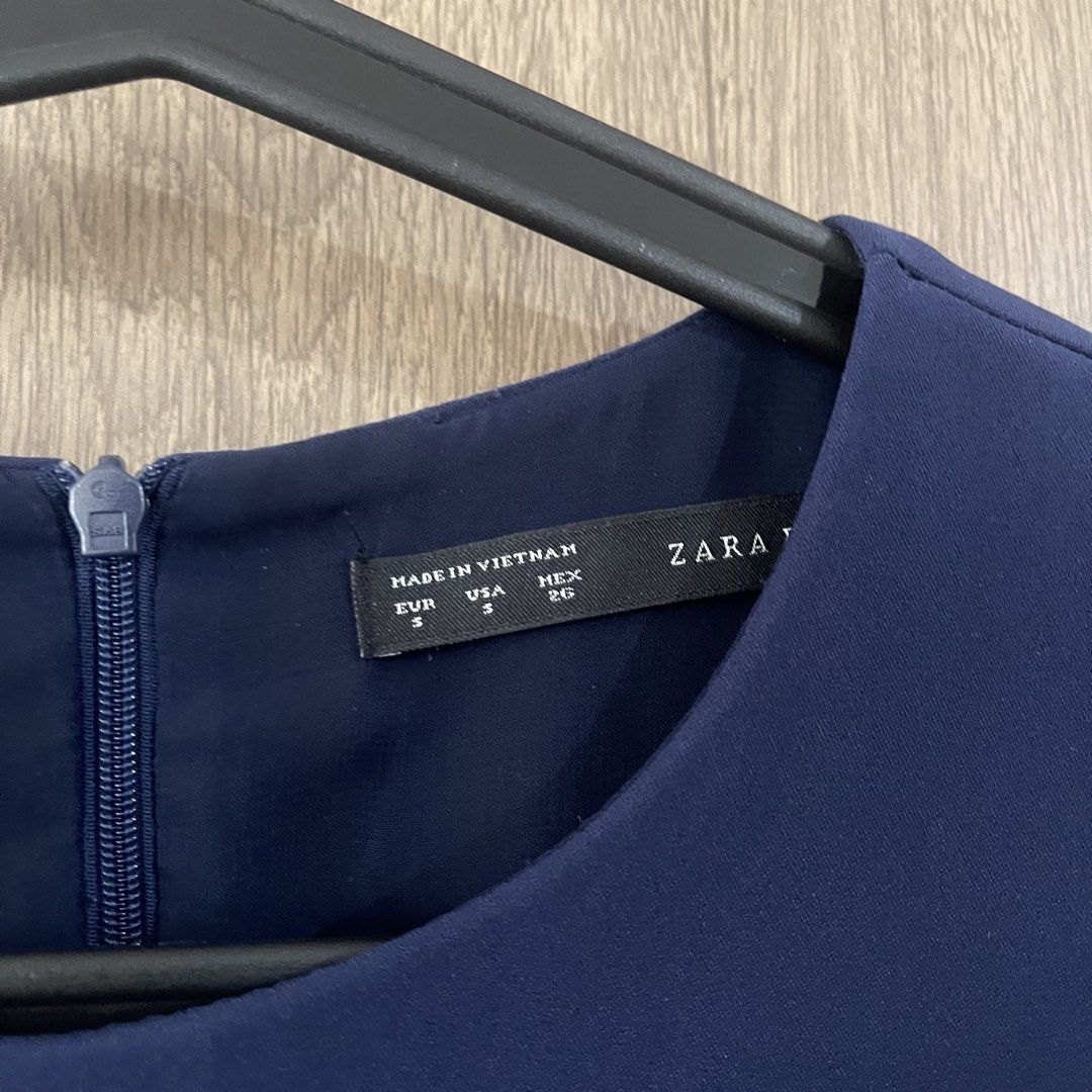 ZARA Navy Blue Dress (Category: Dresses) located in Quezon City. Submitted by jan.aaa (Listing ID 1458724094, Image 2). Description: Preloved ZARA Navy Blue Dress - Lightly used - Three-quarter sleeves - Subtle mesh detail at the waist - Versatile for work or casual wear RFS: Decluttering 📍 Quezon City / Ermita, Manila Shipping to be shouldered by buyer. MOP: GCash / Bank transfer.