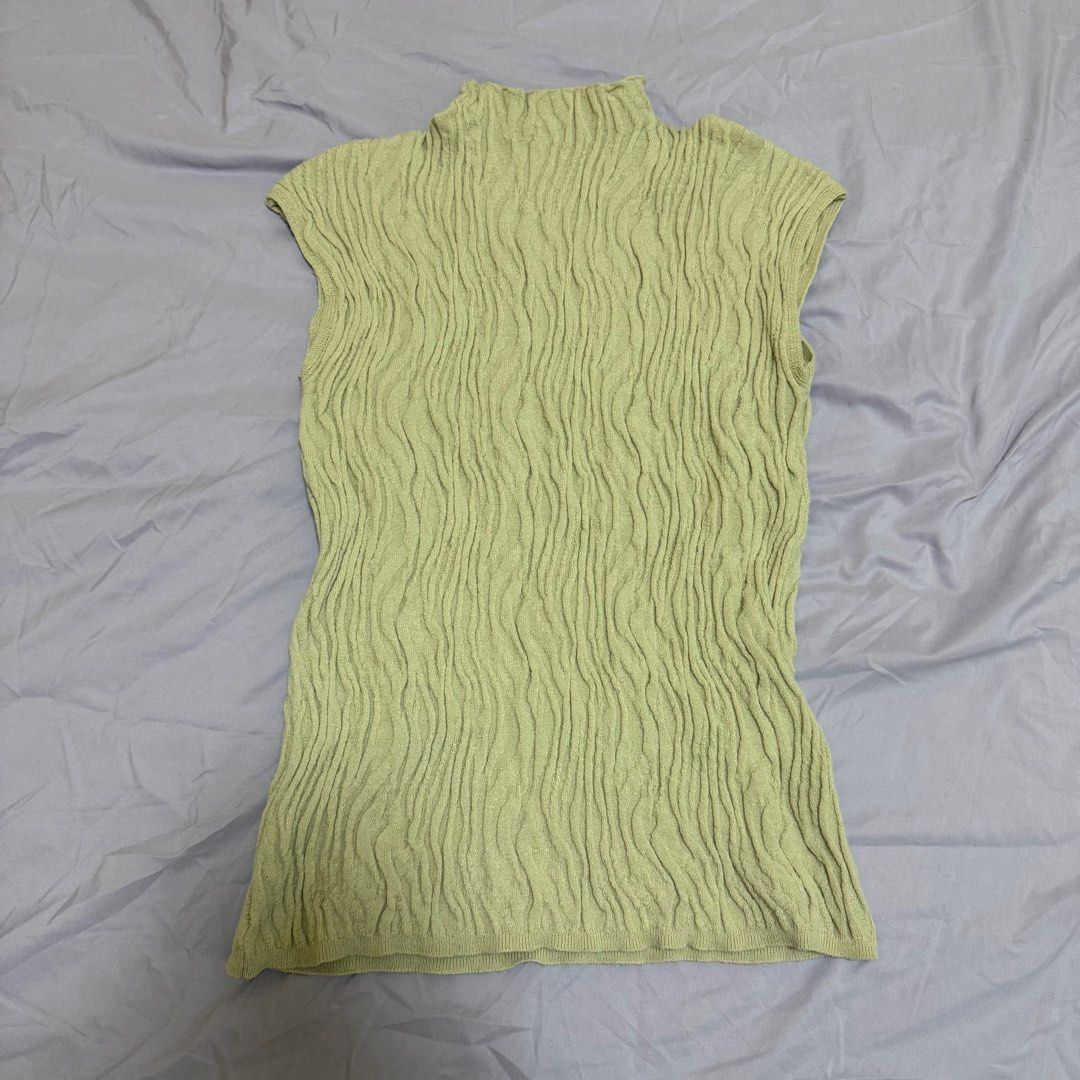 Zara Textured Mock Neck Sleeveless Top (Category: Sleeveless) located in Mandaluyong City. Submitted by shop.sisterscloset (Listing ID 1458694803, Image 2). Description: - Sleeveless Zara top - Unique textured knit pattern - Mock neck design - Perfect for layering or standalone wear - Easily styled for casual or dressy occasions - True to size fit.