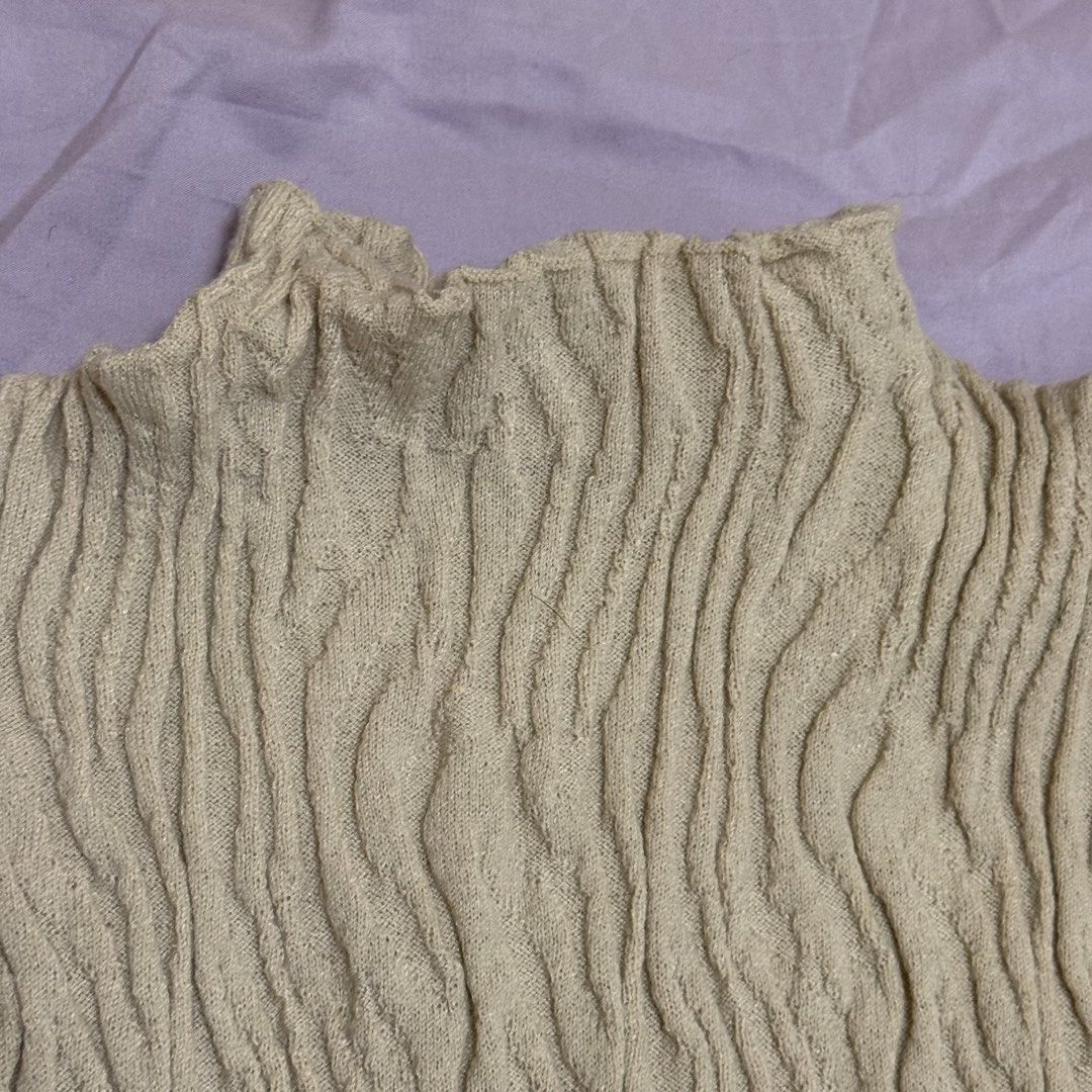 Zara Textured Mock Neck Sleeveless Top (Category: Sleeveless) located in Mandaluyong City. Submitted by shop.sisterscloset (Listing ID 1458694803, Image 3). Description: - Sleeveless Zara top - Unique textured knit pattern - Mock neck design - Perfect for layering or standalone wear - Easily styled for casual or dressy occasions - True to size fit.