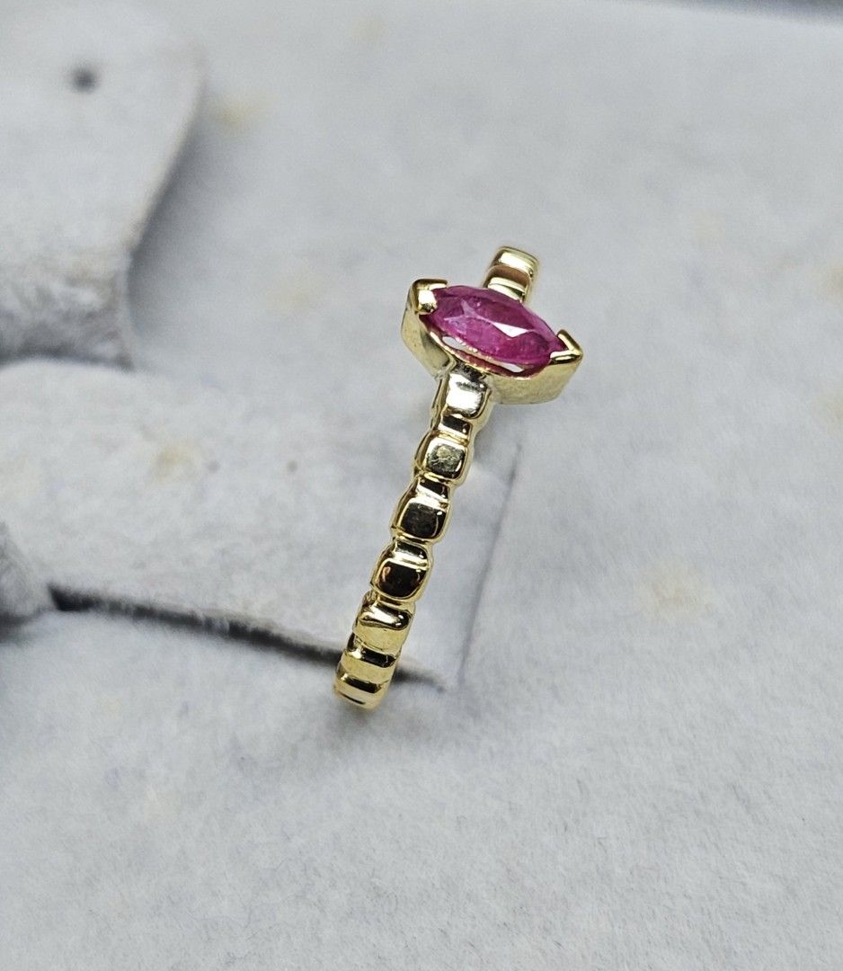14K Pawnable gold dainty bubble ring with marquise cut ruby stone (Category: Rings) located in Cebu City. Submitted by isaira (Listing ID 1453724572, Image 3). Description: - 14K pawnable gold (1.5 grams) - size 4 & 1/2 but can be resize with extra charge - Features a marquise-cut ruby center stone - Dainty band with half bubble texture - Perfect for stacking or solo wear.
