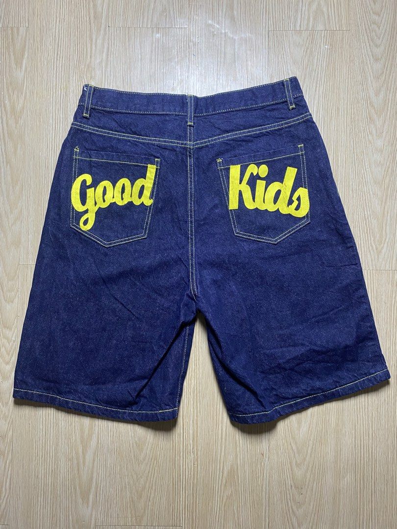 A Few Good Kids Denim Jorts (Category: Shorts) located in Olongapo. Submitted by copnsold (Listing ID 1453747892, Image 2). Description: Dark wash denim shorts from A Few Good Kids. Features yellow contrast stitching throughout. Large yellow 'Good Kids' graphic on the back pockets. Classic five-pocket styling. Button and zip fly closure. Great for casual wear. 32-34.