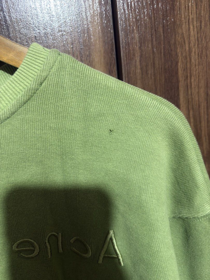 Acne Green Sweater (Category: Others Tops) located in Cavite. Submitted by rrppreloved (Listing ID 1453744438, Image 2). Description: Can fit S-SEMI LARGE Embroidered design Flaw: minimal hole.