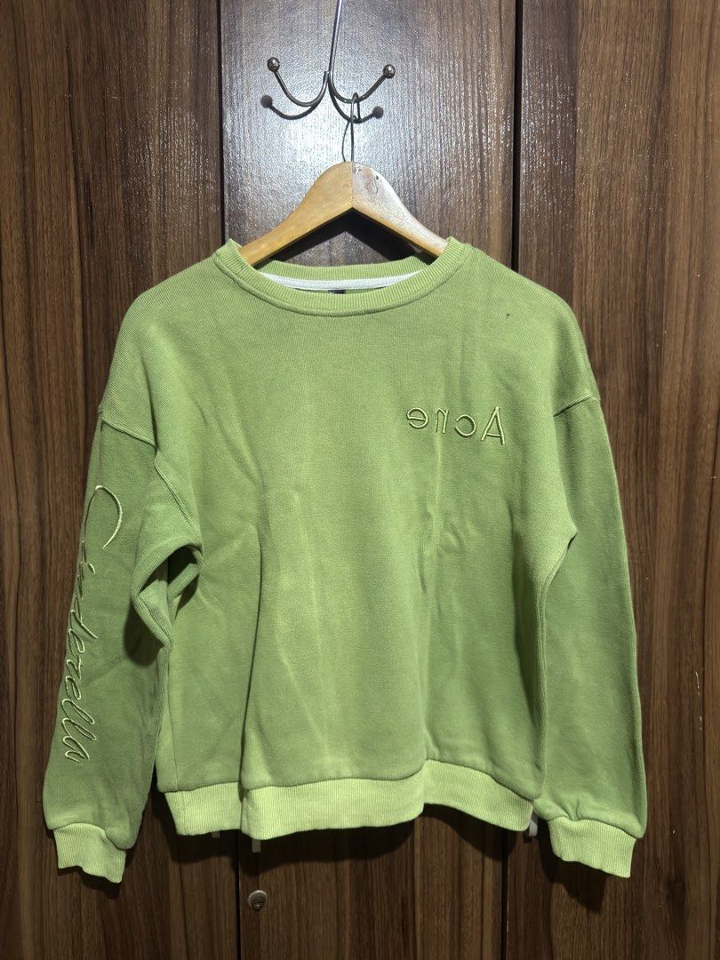 Acne Green Sweater (Category: Others Tops) located in Cavite. Submitted by rrppreloved (Listing ID 1453744438, Image 1). Description: Can fit S-SEMI LARGE Embroidered design Flaw: minimal hole.