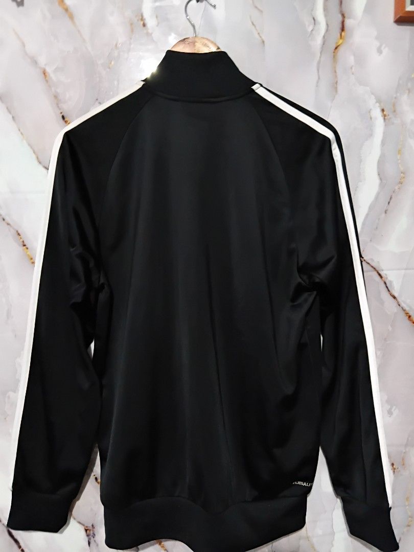 ADIDAS ESSENTIALS WARM UP 3 STRIPES TRACK JACKET (Category: Coats, Jackets and Outerwear) located in General Mariano Alvarez. Submitted by adonid (Listing ID 1453669355, Image 2). Description: ORIGINAL ADIDAS ESSENTIALS WARM UP 3 STRIPES TRACK JACKET GOOD CONDITION NORMAL SIGN OF USAGE ONLY. W36 L27.