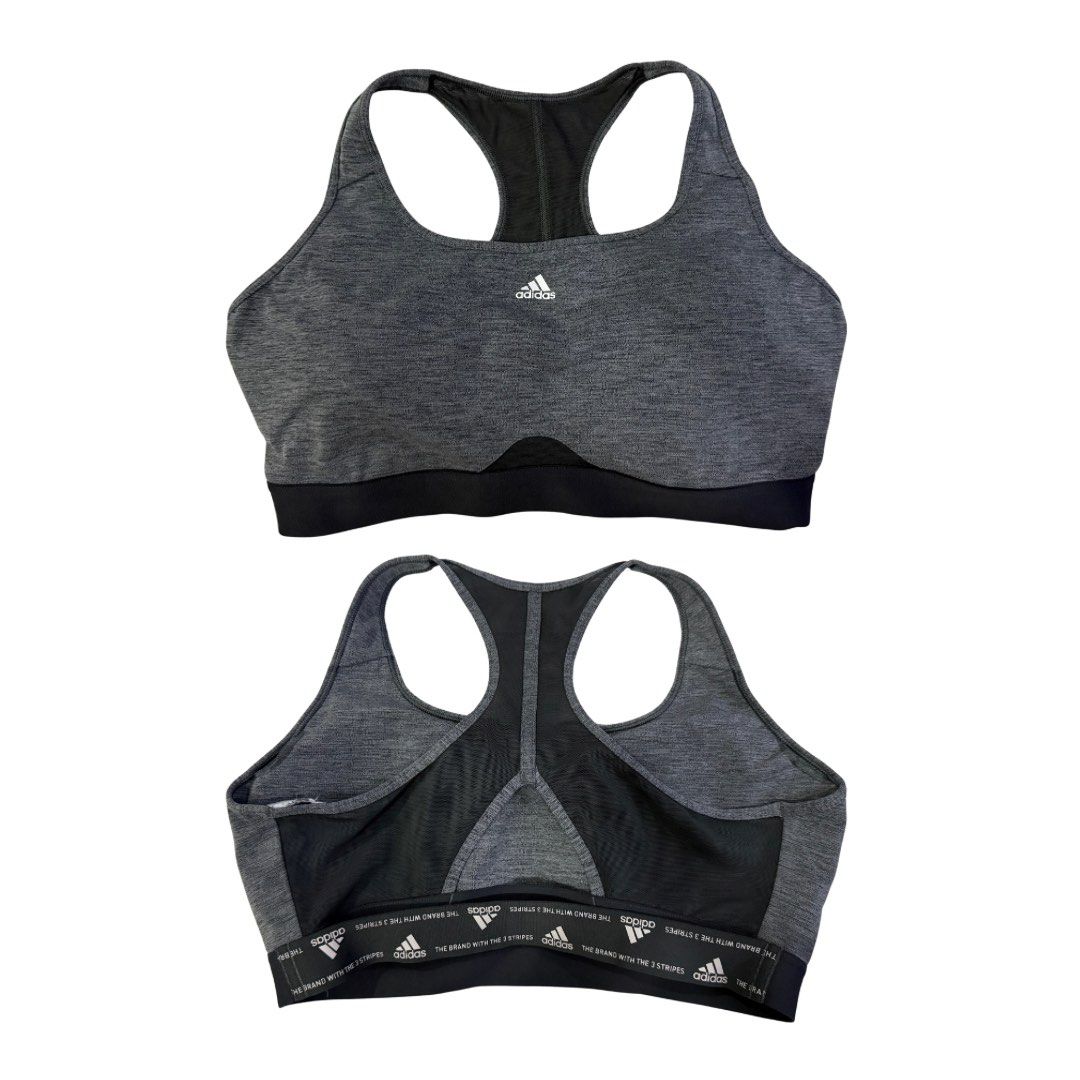 Adidas Grey Sports Bra (Category: Activewear) located in Quezon City. Submitted by nyancath (Listing ID 1453767093, Image 1). Description: Adidas grey heathered sports bra - Racerback design with mesh paneling for enhanced breathability - Elasticated band featuring repeating Adidas logo - Size: XL - Ideal for workouts or everyday comfort.