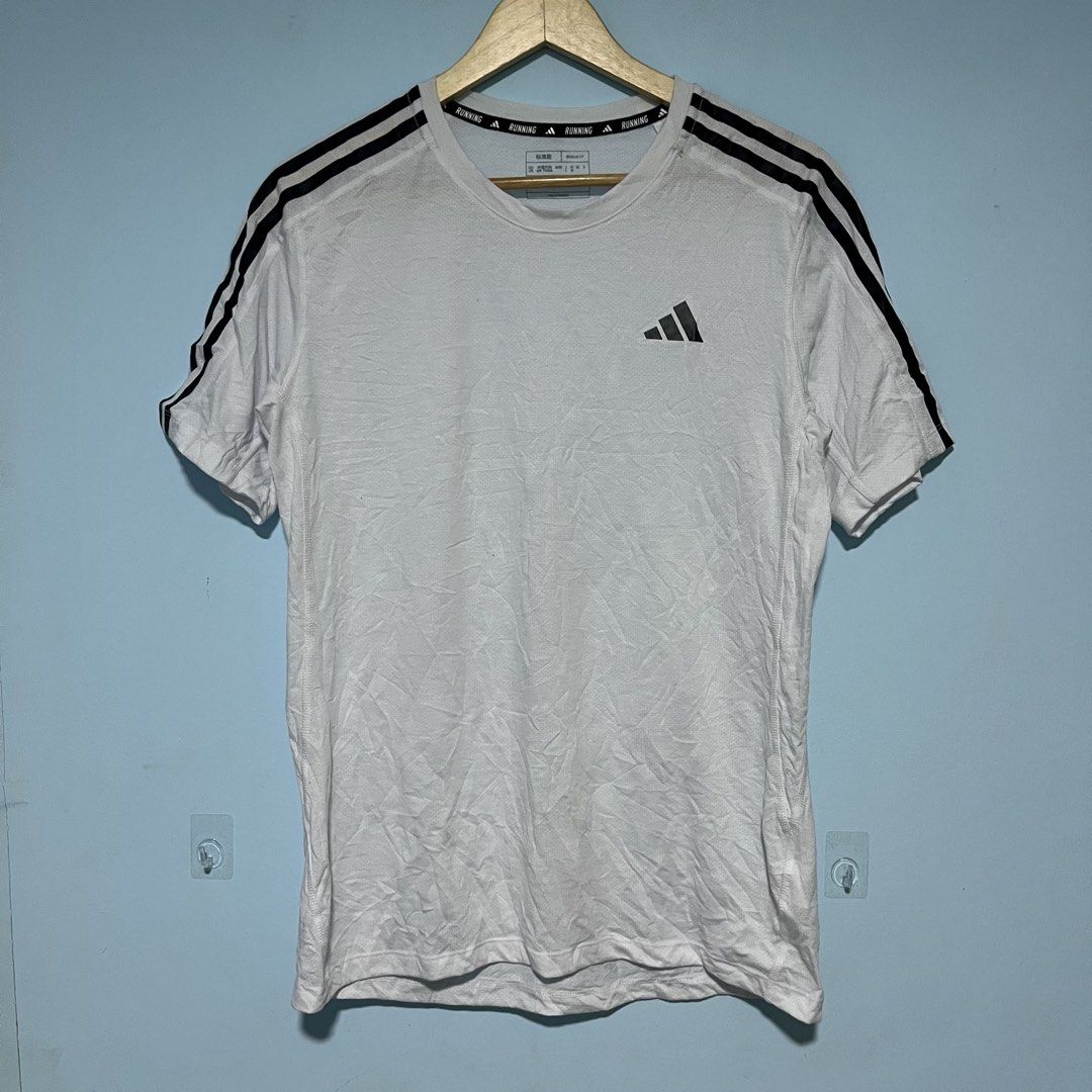 ADIDAS OWN THE RUN 3-STRIPES TEE (Category: Activewear) located in Cagayan de Oro. Submitted by kent_ogals (Listing ID 1453776814, Image 2). Description: ADIDAS OWN THE RUN 3-STRIPES TEE Size Medium Dimes 20.5x27.5 Color Rate 9.8/10 In Excellent Condition No Runstitch 📩.