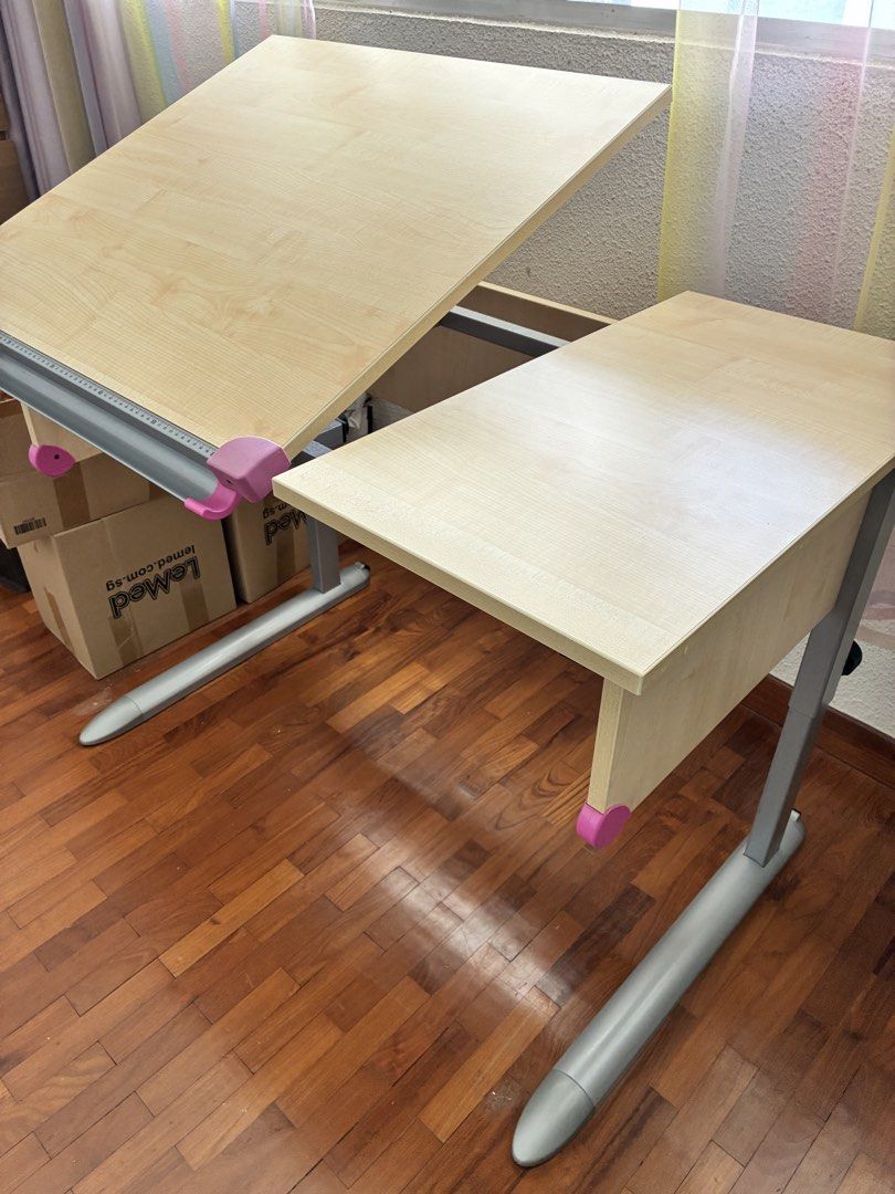 Adjustable study table (Category: Tables & Sets) located in Singapore. Submitted by gsrzen (Listing ID 1453786923, Image 3). Description: .
