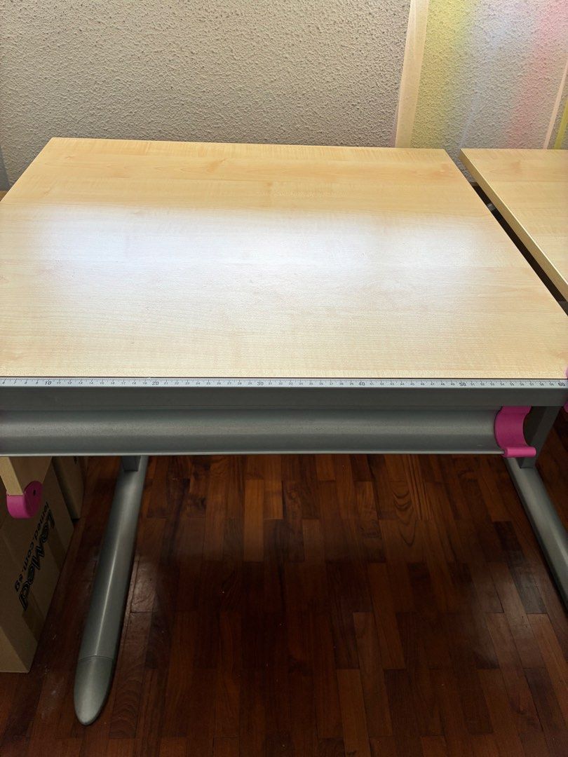 Adjustable study table (Category: Tables & Sets) located in Singapore. Submitted by gsrzen (Listing ID 1453786923, Image 2). Description: .
