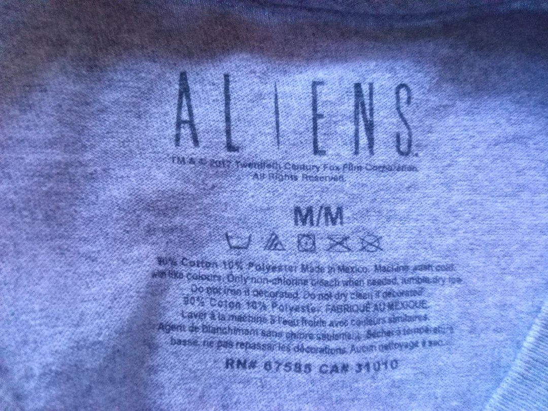 Aliens "Game Over Man" T-Shirt (Category: Tshirts & Polo Shirts ) located in Manila. Submitted by boot_tdm (Listing ID 1453708104, Image 3). Description: - Grey t-shirt with a unique Aliens graphic - Features the Xenomorph playing a video game - Text reads "Game Over Man. Game Over." - Made in Mexico - Size Medium (M).