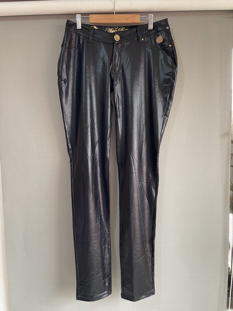 Apple Bottoms Black Faux Leather Pants (Category: Other Bottoms) located in Mataasnakahoy. Submitted by zero4thrift (Listing ID 1453629497, Image 1). Description: - Brand: Apple Bottoms - Material: Faux Leather - Color: Black - Fit: Straight Leg - Details: Gold button accents, embroidered logo on back pockets - Features: Nice sheen, statement piece .