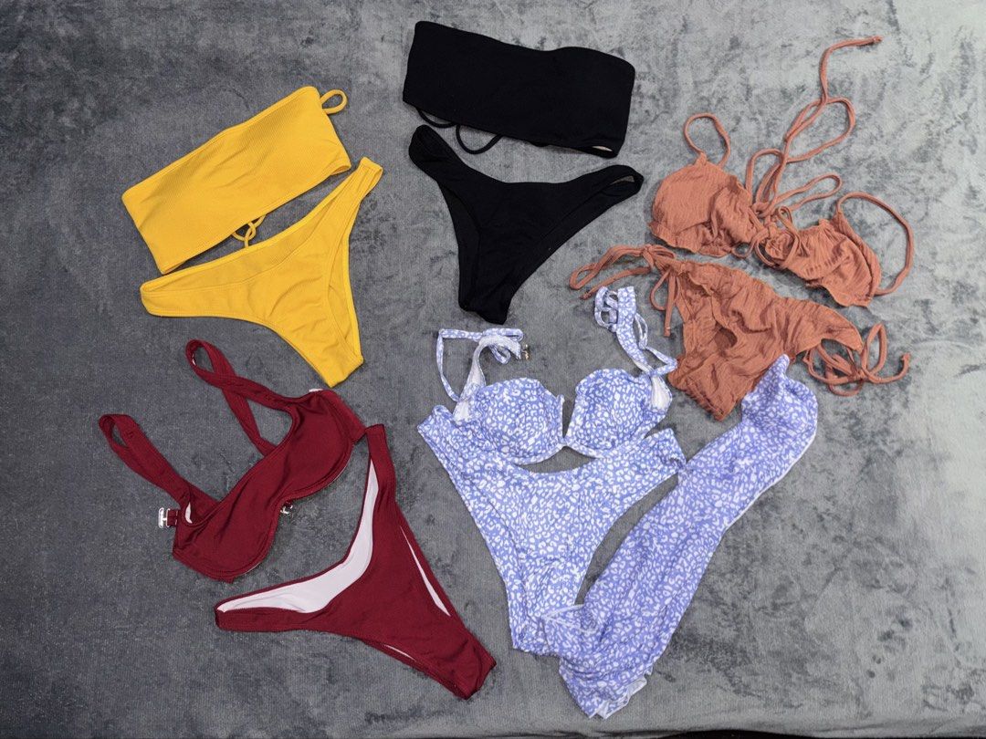 BUNDLE Assorted Bikini Sets - Various Colors and Styles (Category: Bikinis & Swimsuits) located in Manila. Submitted by _closetcleanup (Listing ID 1453806237, Image 1). Description: - Bundle of 5 bikinis, take all for 400 - Only used 1-2x - Includes: yellow and black bandeau sets, rust-colored ruffled set, underwire push up maroon set, and blue floral print bikini with cover up - Perfect for beach trips and pool days - Mix and match for versatile