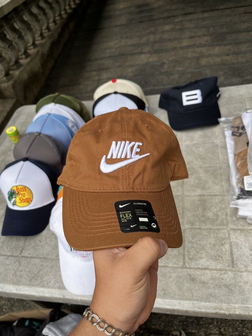 Assorted Caps - Nike, Thrasher, Bass Pro Shops, and more (Category: Caps & Hats) located in Manila. Submitted by five_gallery (Listing ID 1453774957, Image 2). Description: - Bundle of 6 caps - Includes: Nike, Thrasher, Bass Pro Shops, Big Brothers Big Sisters, plain black cap with B logo, and brown military-style cap - Great variety for any cap lover - Condition: Some new, some lightly used.