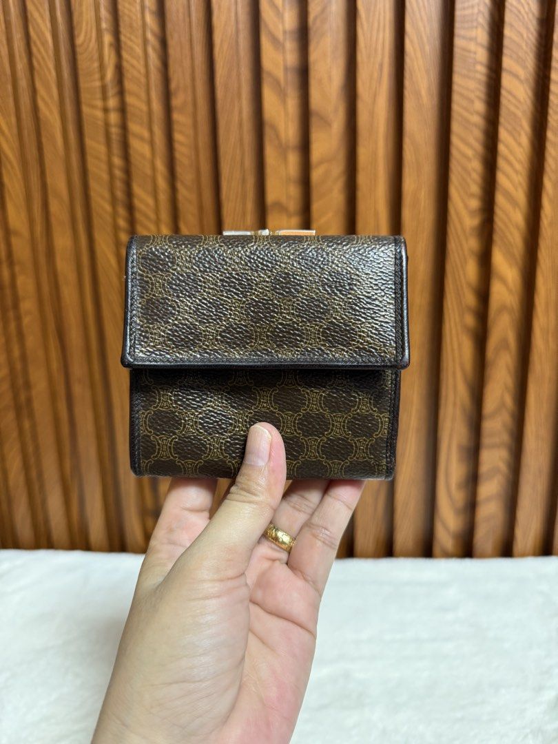 Authentic Celine Monogram Triomphe Canvas Wallet (Category: Wallets & Card holders) located in Subic. Submitted by luxshoppe88 (Listing ID 1453710082, Image 2). Description: - Classic Celine wallet in iconic Triomphe canvas - Color: Brown and Gold - Features a secure snap closure - Multiple card slots for your essentials - Compact size, perfect for any bag - A timeless and elegant accessory mode of payment : bpi and gcash shipping will be done on