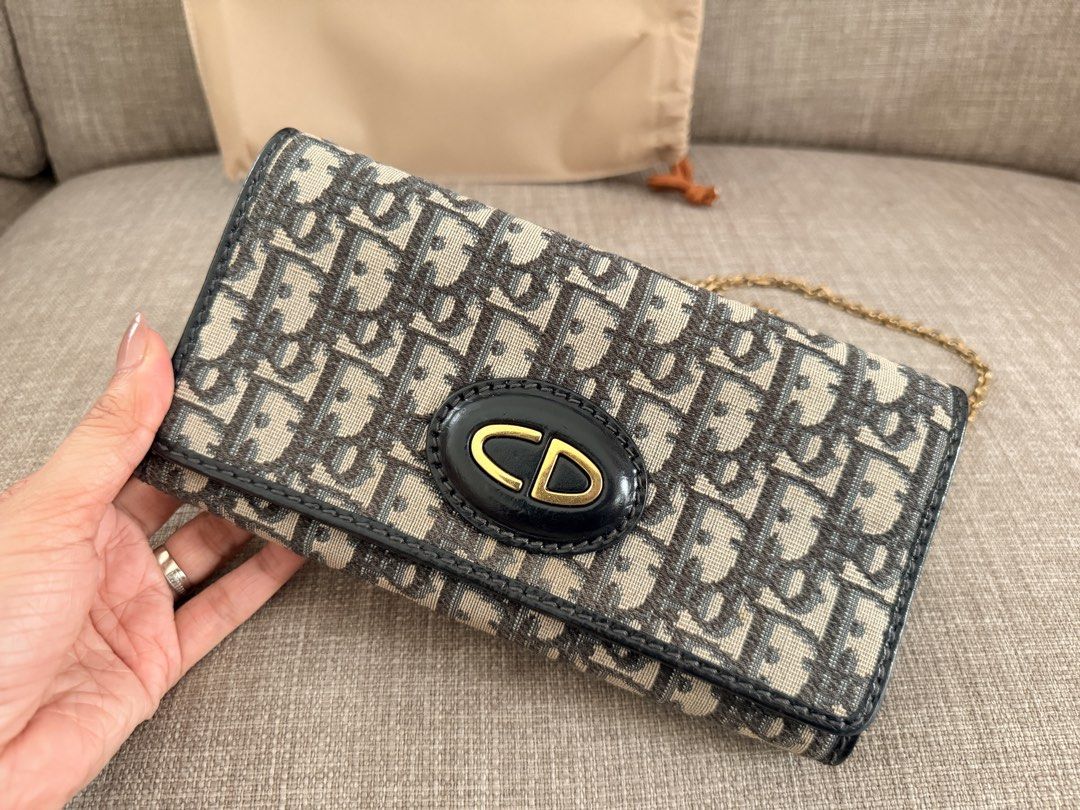Authentic Christian Dior Oblique Wallet on Chain (Category: Luxury Bags & Wallets) located in Marikina City. Submitted by jecsq_ (Listing ID 1453648220, Image 2). Description: ✔ Authentic (Entrupy Certified) ✔ Purchased from Taiwan ✔ Comes with: * Entrupy Certificate * Original Taiwan boutique receipt * Official Taiwan invoice * Dust bag * Dior shopping bag ✔ Gold-tone hardware ✔ Excellent vintage condition ✔ Clean interior ✔ Chain included ✔ Mul