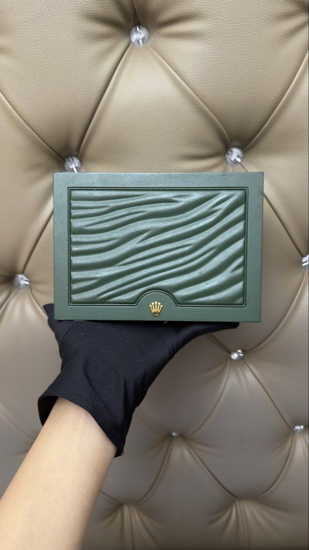 authentic Rolex Watch Box with Papers and Accessories (Category: Luxury Watches) located in Manila. Submitted by tepohj888 (Listing ID 1453786120, Image 2). Description: Selling a complete set for a Rolex watch. Includes the original green Rolex box, outer sleeve, warranty card, and instruction manuals. Also comes with a Rolex cleaning cloth. Perfect for completing your Rolex set..