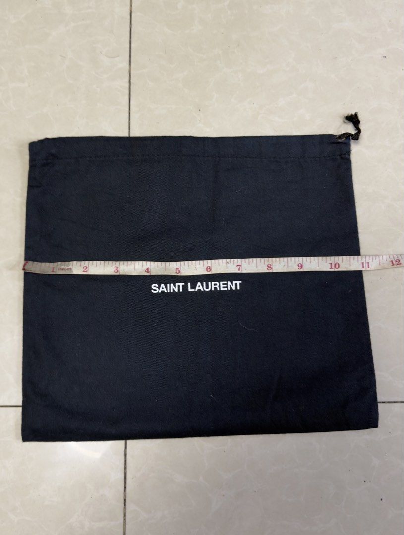 authentic Saint Laurent Black Dust Bag (Category: Luxury Bags & Wallets) located in Manila. Submitted by tepohj888 (Listing ID 1453746842, Image 2). Description: Dimensions: Approx. 11 iinches wide x 9.5 inches tall Ideal for storing small bag & long wallet Protects your valuable items.
