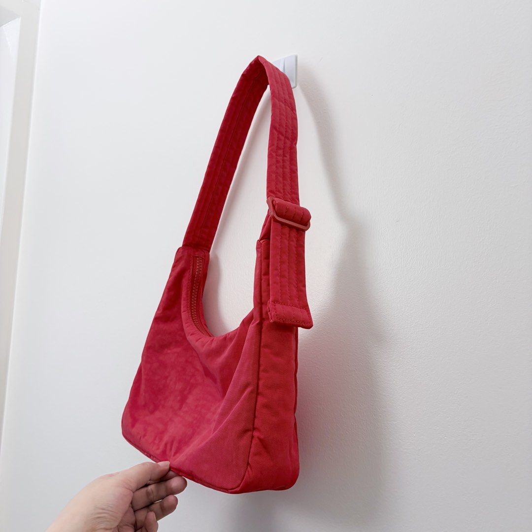Baggu - Mini Nylon Shoulder Bag - Candy Apple color (Category: Shoulder Bags) located in Quezon City. Submitted by karenfernandez (Listing ID 1453719408, Image 2). Description: Baggu Nylon Shoulder Bag in Candy Apple ✅No more tags, but never used! ✅Bought at ₱3,350 from Certified Calm ✅interior pocket ✅Durable nylon material ✅Spacious ✅Lightweight RFS: Want a new color from Baggu 🤭 📍QC, Aurora Blvd. Near Katipunan 📦 Lalamove or GrabExpress or 