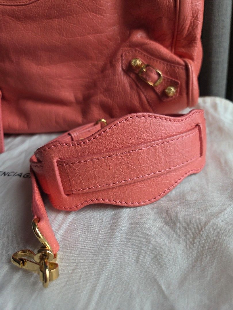 Balenciaga Velo Rose Azalee GHW (Category: Luxury Bags & Wallets) located in Quezon City. Submitted by shop.mar.go (Listing ID 1453663155, Image 3). Description: excellent condition Balenciaga Velo rose azalee (close to peach color) gold hardware inclusion posted in the 1st photo has minor dirt marks used few times only still clean and no foul smell..