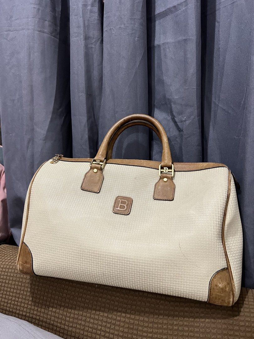 Bally Vintage Boston Bag (Category: Luxury Bags & Wallets) located in Batangas. Submitted by thegudoldays (Listing ID 1453760552, Image 1). Description: This is a vintage Bally B-logo monogram boston bag made of canvas and leather. Details and issues posted. (on pics) Condition 8/10 Good condition (easy to restore) Need wash ₱2500 only.