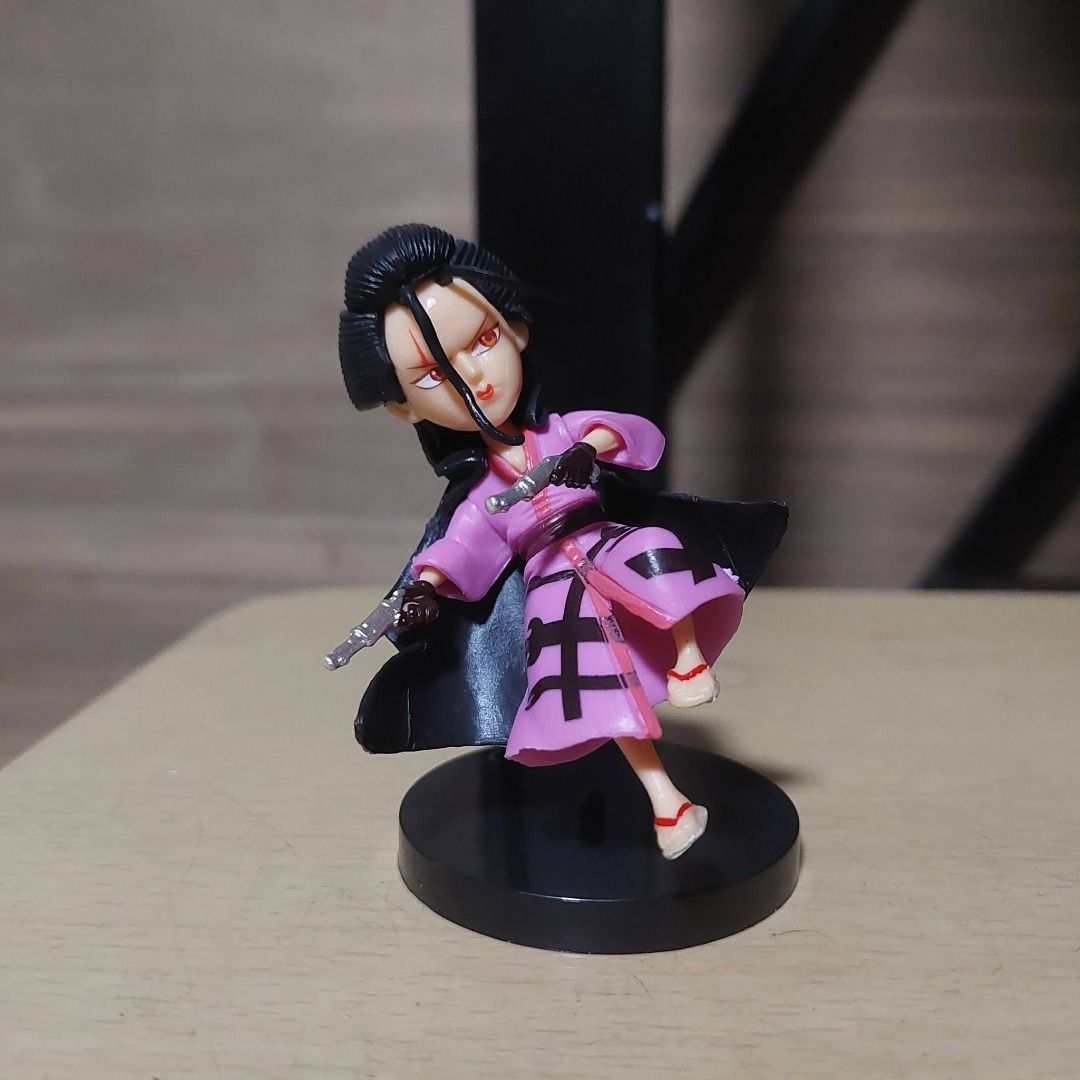 Ban Presto One Piece Izo (Loose) (Category: Figurines & Statues) located in Pasig City. Submitted by calmdragon (Listing ID 1453742819, Image 1). Description: - Adorable anime figure - Wears a pink kimono with black stripes - Features a stylish black cape - Wields two gleaming silver swords - Striking black hair and intense red eyes - Presented on a stable black display base - Ideal for anime enthusiasts and collectors.