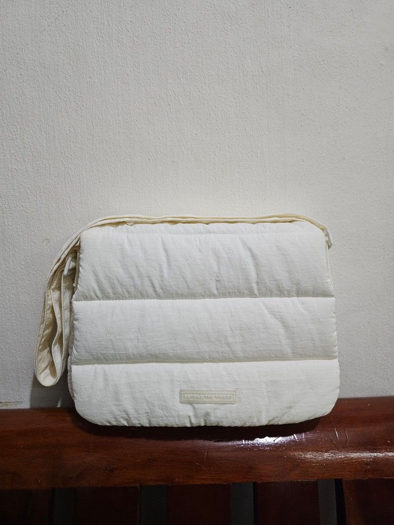 Beyond The Vines Poofy Bag in White (Category: Cross-body Bags) located in Makati City. Submitted by missdeclutterer (Listing ID 1453691139, Image 3). Description: Original BTV Poofy Bag in White 🤍 - Priced at Php 3790 on BTV's website - Comes complete with dust bag and inner detachable pouch - No chips on metal hardware - Bag and straps still look white, although inner side of shoulder straps have a slight discolouration from use RFS: Declutter