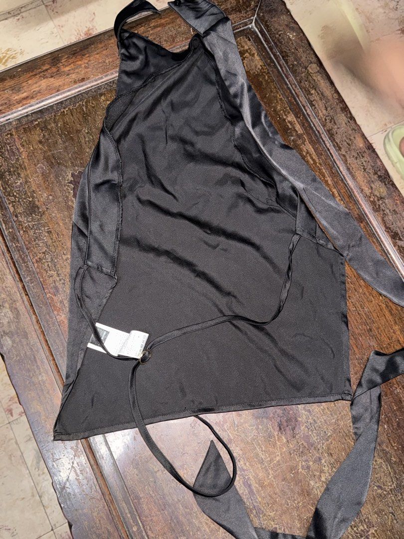Black Backless Satin Halter Neck Top XS (Category: Sleeveless) located in Manila. Submitted by afyuuu_ (Listing ID 1453784771, Image 2). Description: - No when worn - XS.
